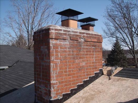 Before - Deteriorated chimney and cap